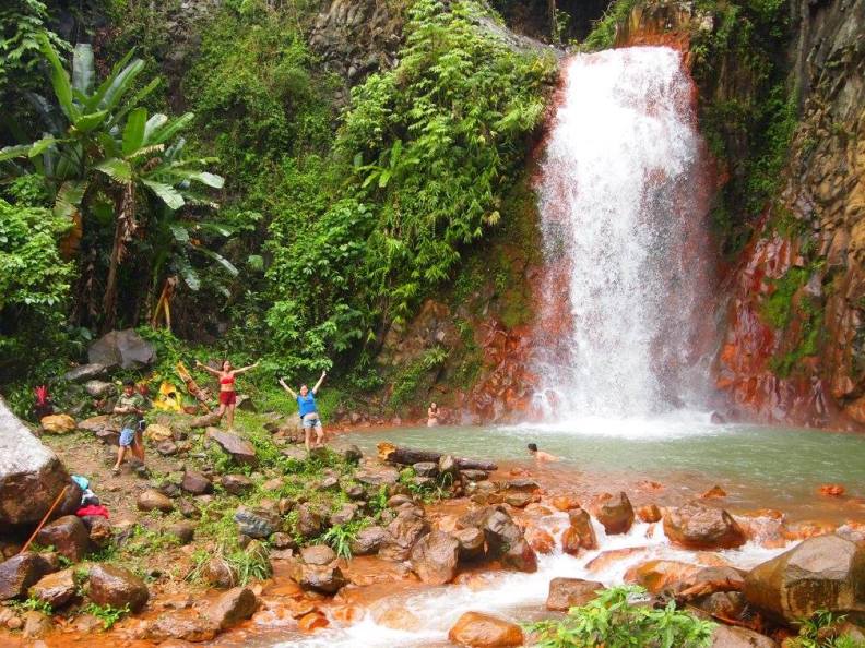 pulangbato waterfall rustic red rocks